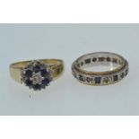 Two 9ct gold rings, including: a sapphire & diamond cluster, size N & a sapphire & white stone etern
