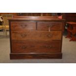 Edwardian mahogany two over two chest of drawers. 107cm wide x 56cm deep x 85cm high.