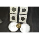 Seven coins including Roman