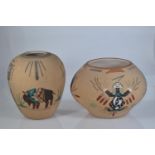 Two Native American Navajo sand painted pots, one signed but illegible, tallest 13cm height