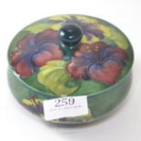 Moorcroft 'Hibiscus' pattern pot & cover, impressed mark & paper label to underside of cover & to ba