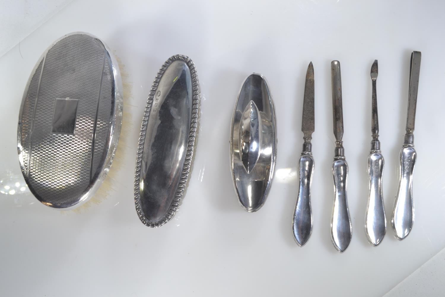 Five piece silver handled manicure set, maker William Devenport, Birmingham 1905, together Birmingha