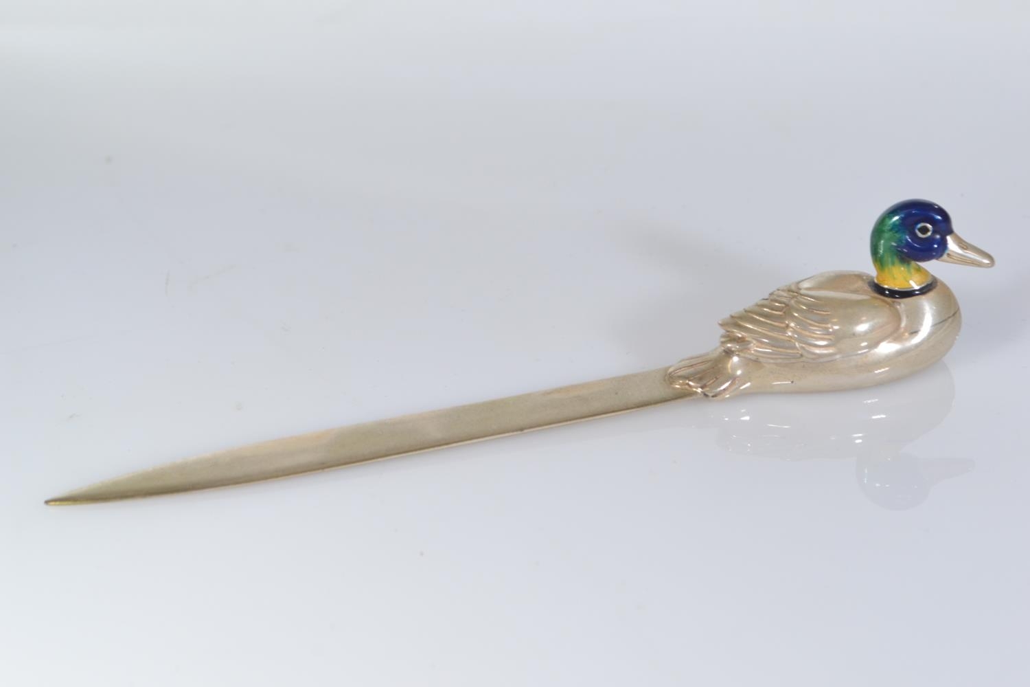 Silver letter opener with enamelled duck handle, with import hallmark for Mark Houghton Ltd, Sheffie