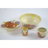 Four pieces of Clarice Cliff 'Crocus' pattern, including a bowl, grapefruit bowl, pot & coffee can,