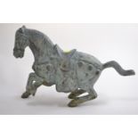 Bronze patinated model of a Tang horse, H28cm L45cm