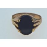 9ct gold signet ring set with black onyx, hallmarked Chester 1959, size X, 6.2 grams