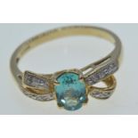 9ct gold, topaz & diamond 'bow' ring, hallmarked Birmingham, size N1/2, 2.1 grams