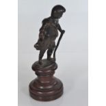 Bronze figure of a soldier on a wooden base, 19cm height including base