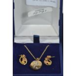 Pair of 10ct gold earrings, 1.2 grams, & 9ct gold 'Footpints' locket & chain, 1.8 grams