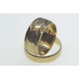 Two 9ct gold band rings, both hallmarked London, size R & W respectively, gross weight 8.5 grams