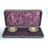 Cased pair of late Victorian silver salts & spoons, maker Thomas Hayes, Birmingham 1895, gross weigh