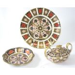 Three pieces of Royal Crown Derby Imari patterned porcelain, comprising: a plate, dated 1976, patter