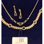 9ct gold, blue sapphire & white sapphire bracelet, a necklace and pair of earrings with dark sapphir