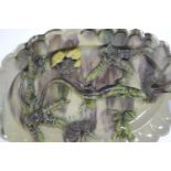 Palissy style oval dish, applied with a lizard, frogs, fungi & plants, unmarked, diameter 31cm