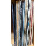 Thirty vinyl albums inc. Mudslide Slim, Billy Joel, Gregg Allman, Tom Jones and Dire Straits etc.