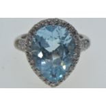 18ct white gold, blue topaz & diamond cluster ring, size L1/2, 8.15 grams