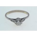 Diamond ring, centring a claw-set brilliant-cut diamond weighing approximately 0.75 carat, between d