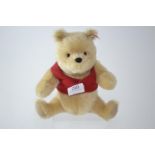 Steiff Collectors Winnie the Pooh, with ear tag & label, length 20.5cm