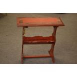 Red chinoiserie Oriental style book trough / shelf. 62cm wide.
