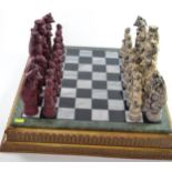 Resin Reynard the Fox inspired chess pieces, together with Compton and Woodhouse marble chess board,