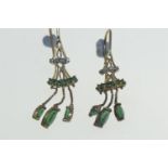 Pair of 9ct gold, emerald & diamond chandelier style earrings, each set with five navette-shaped eme