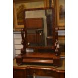 Mahogany swing mirror, with single drawer and scrolled arms. Height 85cm