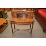 Mahogany ladies leather topped writing desk with fine fluted legs and two drawers, comprising small