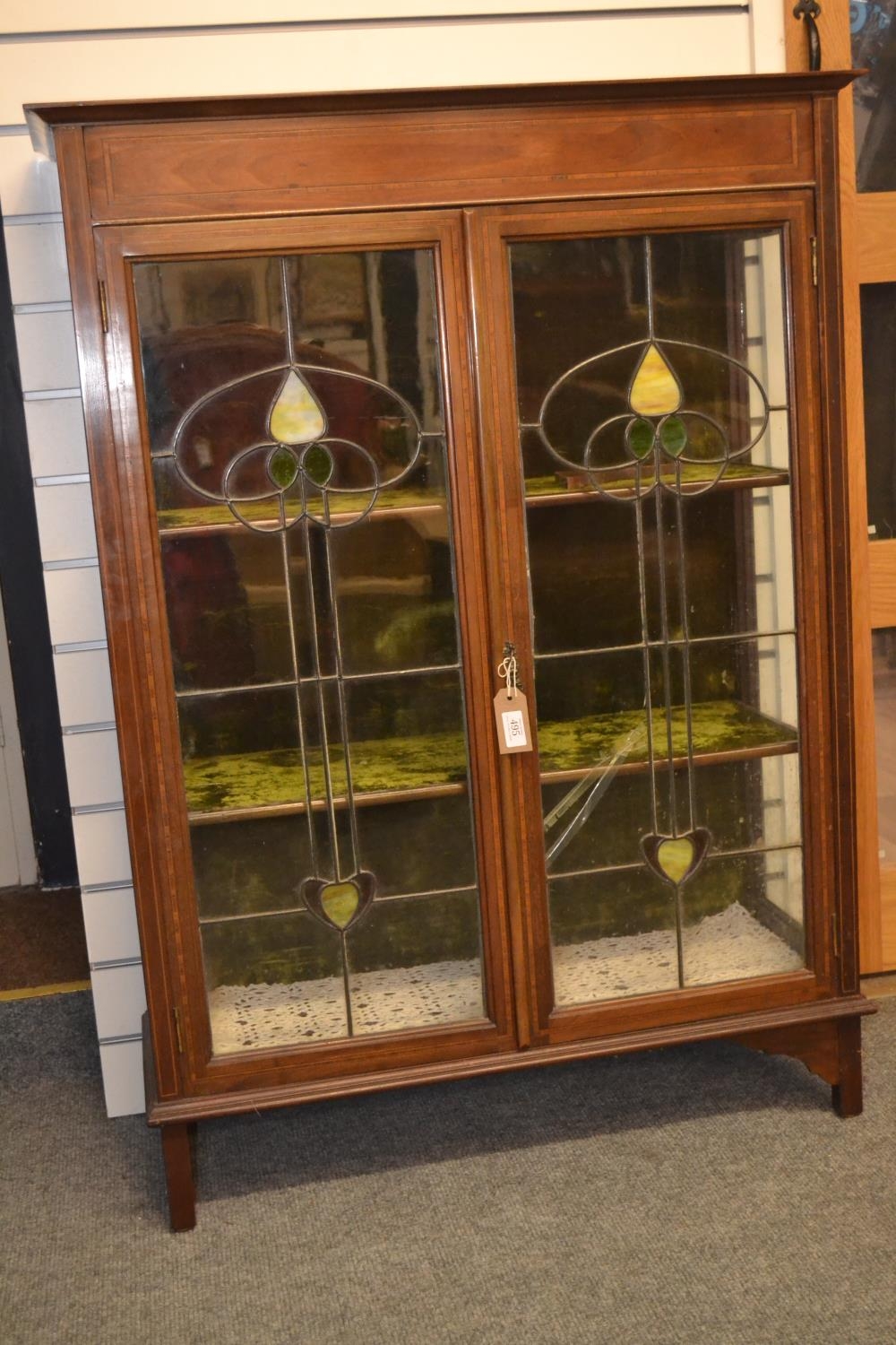 Art Nouveau stained leaded glass fronted display cabinet. (1 panel cracked) 87cm x depth 34cm x heig