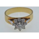 18ct gold & diamond cluster ring, the centre stone weighing approximately 0.33 carat, size O1/2, 4.5