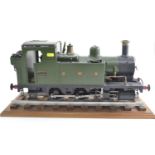 3.5" gauge model steam locomotive, model 1399 GWR. Working order is unknown. Includes plinth/track s