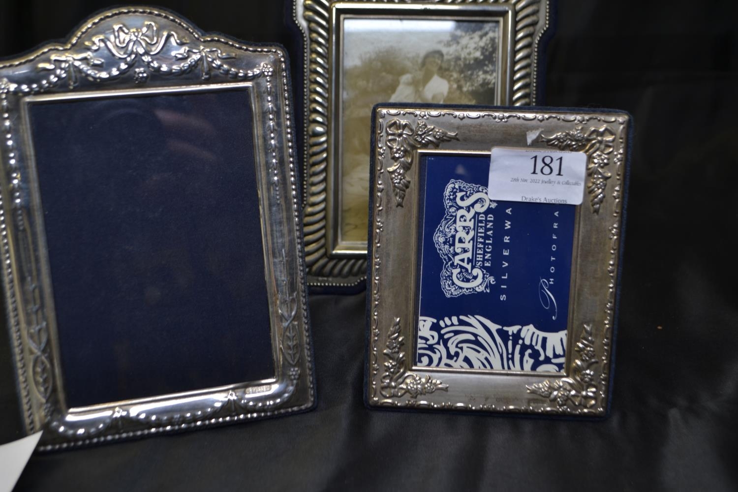 Three silver photo frames, largest marked T.S LTD with lion, the other two hallmarked for Carr's of  - Image 2 of 2