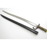 A French M1866 Chassepot Yataghan Sword Bayonet. L70.5cm. Back of blade impressed 'St Etienne 1868'.