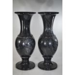 A pair of black onyx vases, ht. 32cm dia.12.5cm