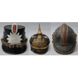 Konvolut Helme/ three helmets