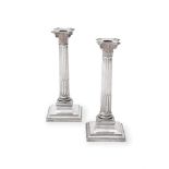 A PAIR OF LATE VICTORIAN SILVER CORINTHIAN COLUMN CANDLESTICKS, HAWKSWORTH