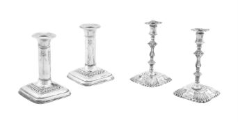 TWO PAIRS OF SMALL SILVER CANDLESTICKS