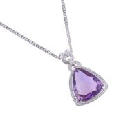 AN AMETHYST AND DIAMOND DROP PENDANT