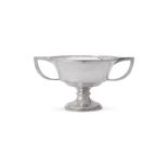 A SILVER TWIN HANDLED PEDESTAL CUP, WILMOT MANUFACTURING CO.