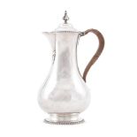 AN EDWARDIAN SILVER BALUSTER COFFEE JUG, HOLLAND