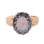 AN OPAL AND DIAMOND CLUSTER RING, LONDON 1970