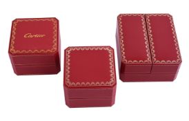 CARTIER THREE RED WATCH BOXES WITH GILT TOOLING