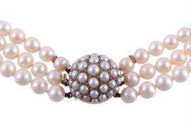 A THREE ROW CULTURED PEARL NECKLACE