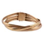 A 1960S ITALIAN THREE ROW GOLD COLOURED BRACELET