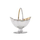 A GEORGE III SILVER SHAPED NAVETTE SUGAR BASKET, GEORGE SMITH II