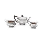 A MATCHED OBLONG BALUSTER THREE PIECE TEA SERVICE, THOMAS BRADBURY & SONS