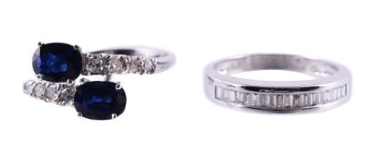 A SAPPHIRE AND DIAMOND CROSSOVER RING