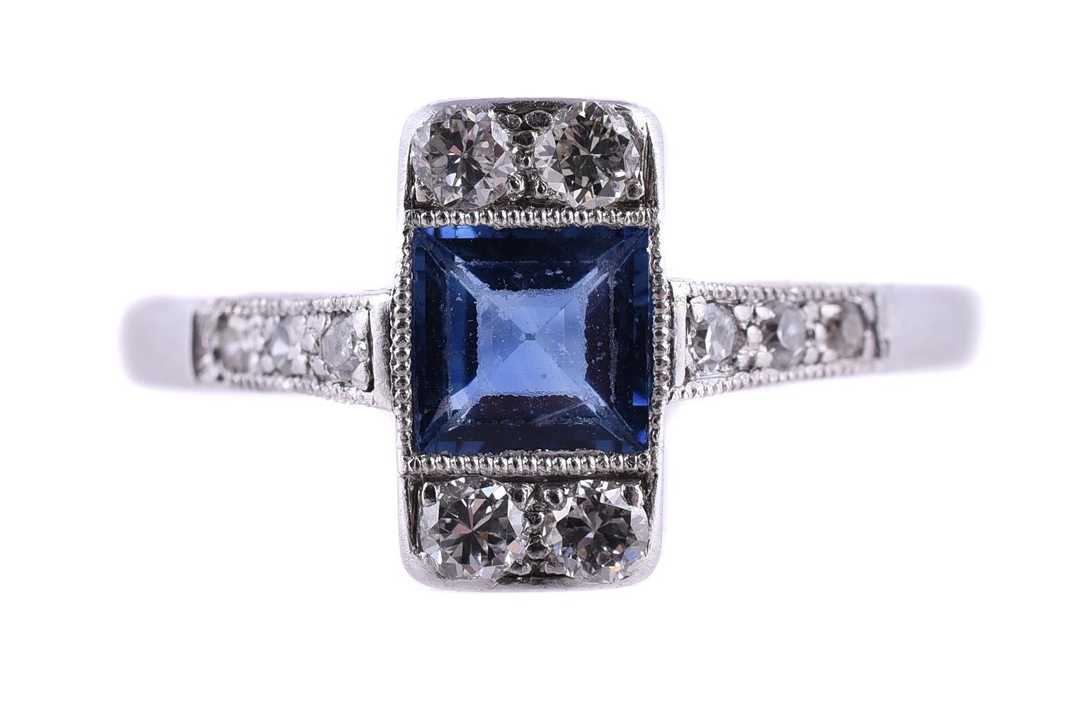 A 1930S SAPPHIRE AND DIAMOND PANEL RING