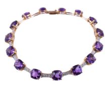 AN AMETHYST AND DIAMOND BRACELET