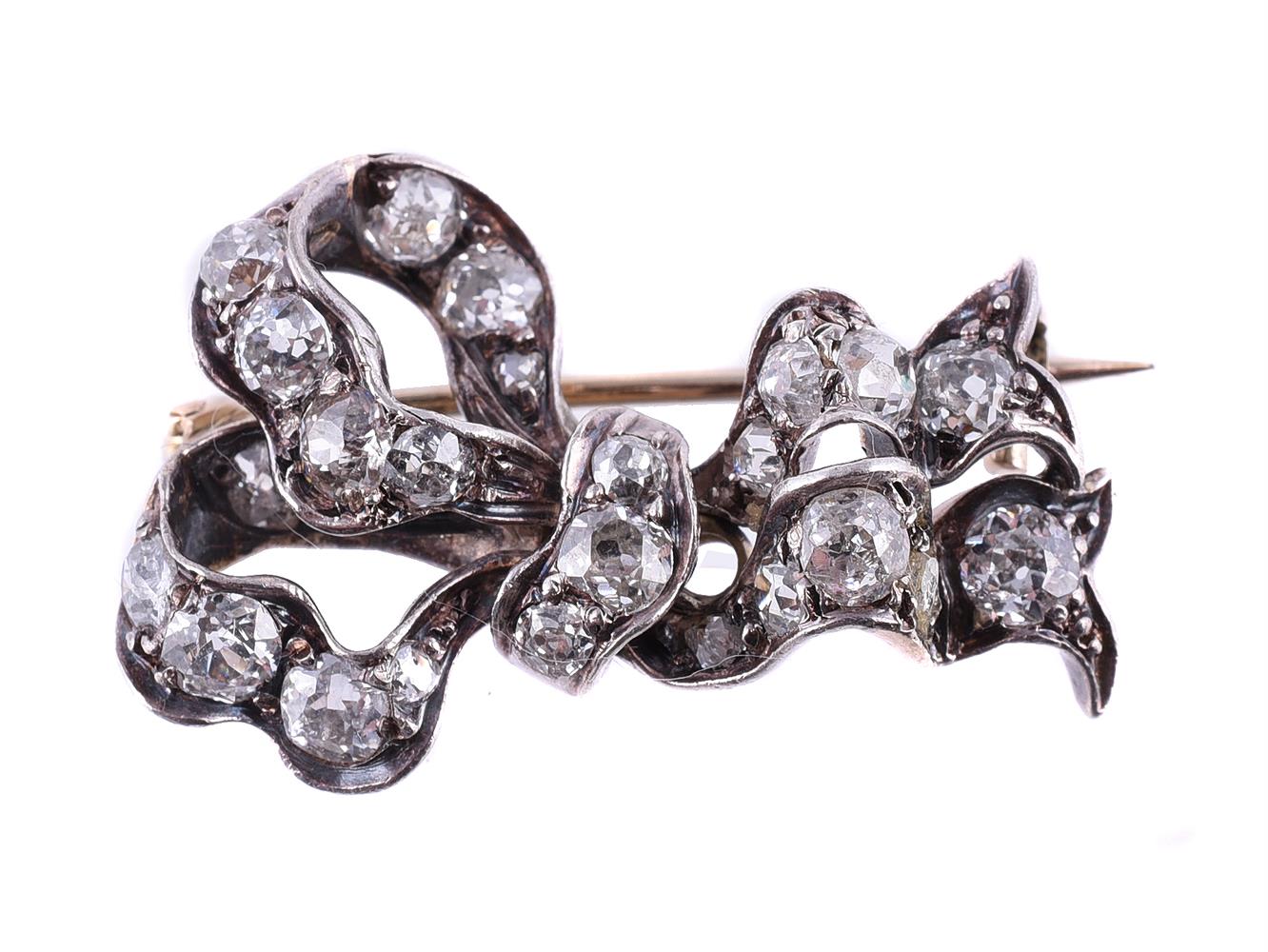 A LATE 19TH CENTURY DIAMOND BOW BROOCH