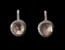 A PAIR OF POLKI DIAMOND EARRINGS